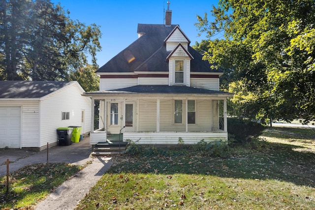 victorian home with a front lawn and a porch