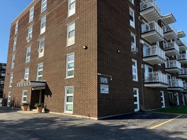 view of property featuring cooling unit