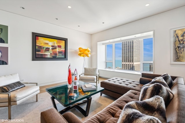 800 N Michigan Ave Unit 4001, Chicago, IL 60611 - living room with wood finished floors, baseboards, and recessed lighting