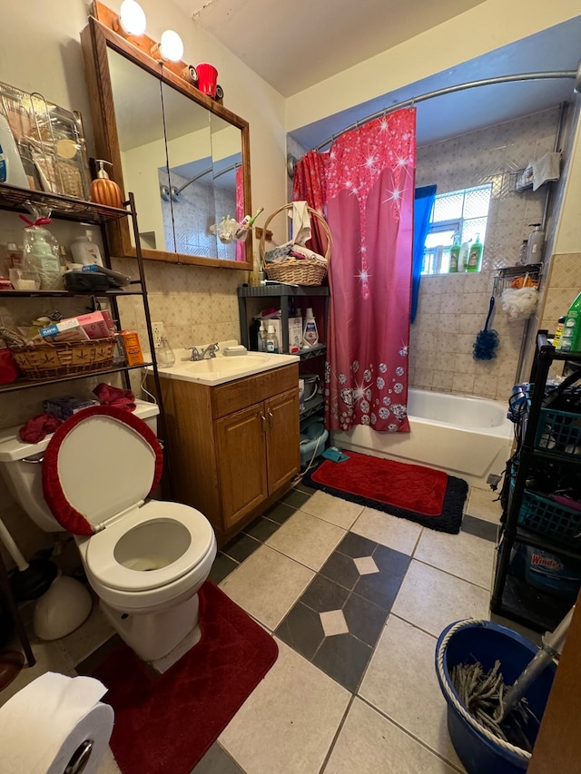 full bathroom featuring shower / tub combo, vanity, toilet, and tile patterned floors