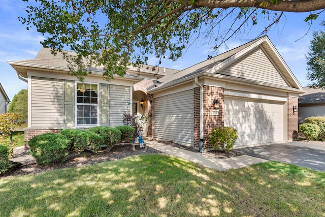 ranch-style home featuring a front yard and a garage