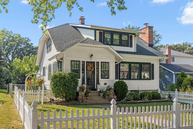 view of front of home with a front lawn