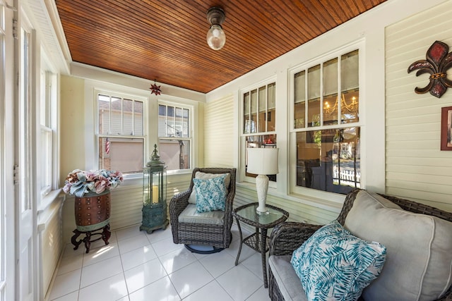 sunroom / solarium featuring wooden ceiling