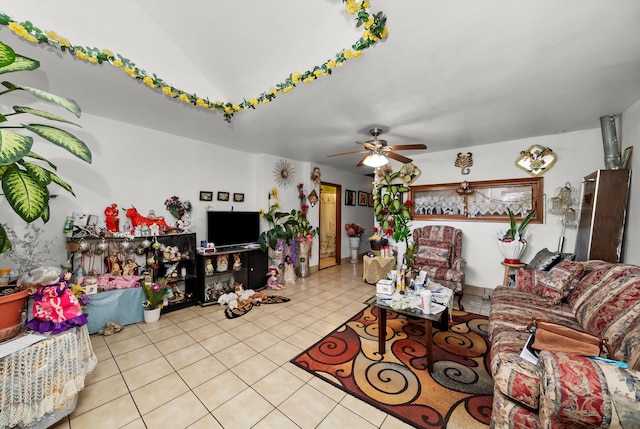 tiled living room featuring ceiling fan