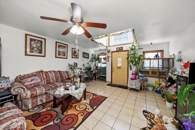 tiled living room featuring ceiling fan