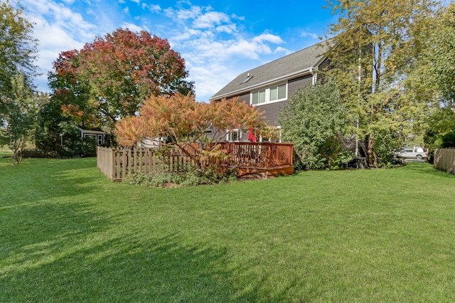 view of yard with a wooden deck