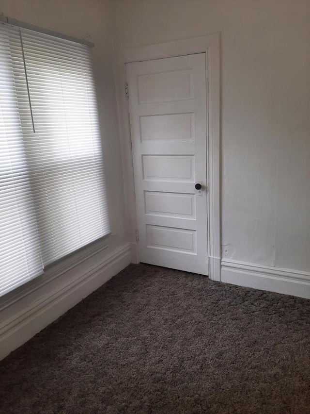 109 E Chamberlin St, Dixon, IL 61021 - carpeted spare room featuring baseboards