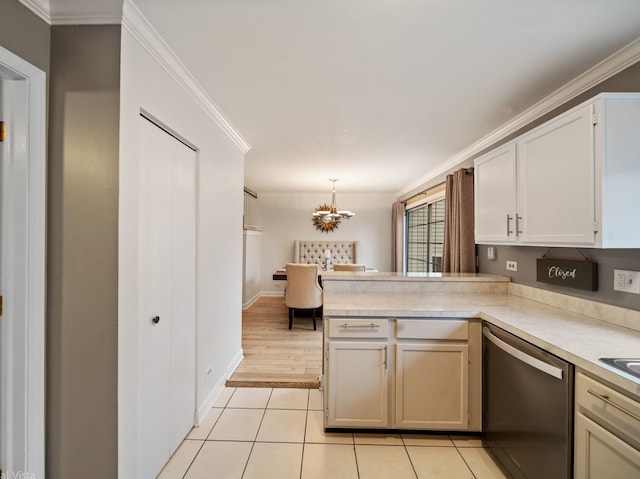 kitchen featuring dishwasher, ornamental molding, pendant lighting, and kitchen peninsula