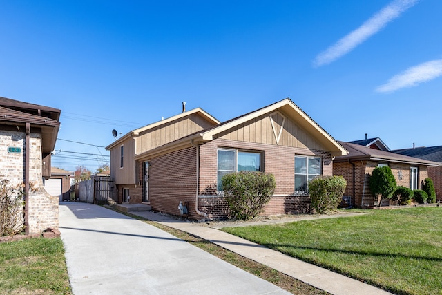 view of property exterior featuring a yard and a garage