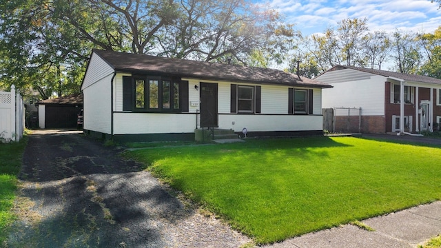 single story home featuring a front yard