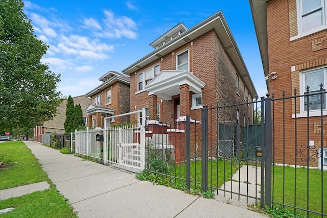 view of front of home featuring a front lawn