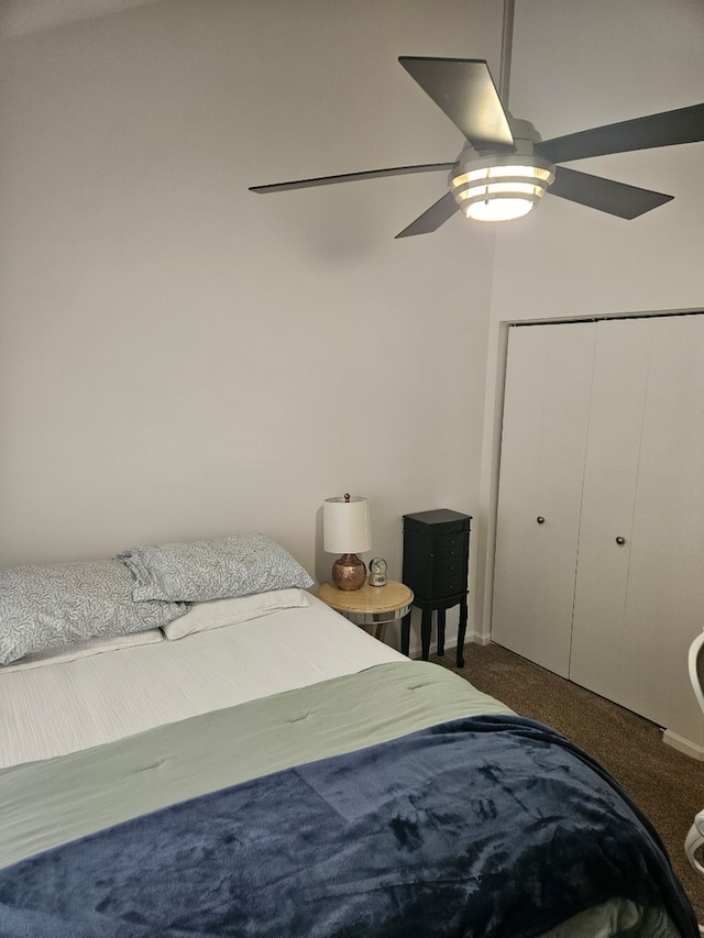 bedroom with carpet, ceiling fan, and a closet