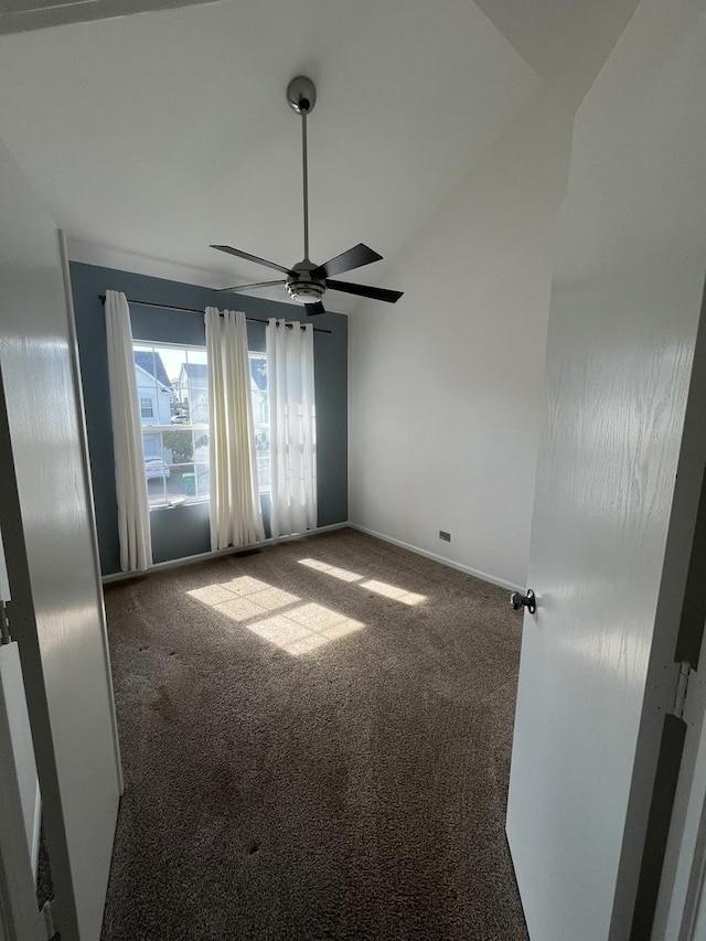 17437 Yakima Dr, Lockport, IL 60441 - spare room featuring ceiling fan, carpet, baseboards, and lofted ceiling