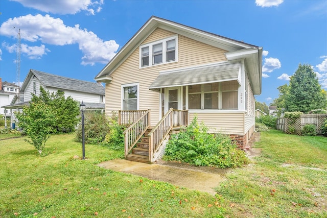 view of front facade featuring a front yard