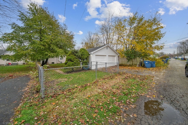 view of yard featuring a garage