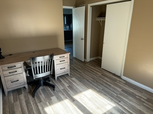 office area with dark hardwood / wood-style flooring