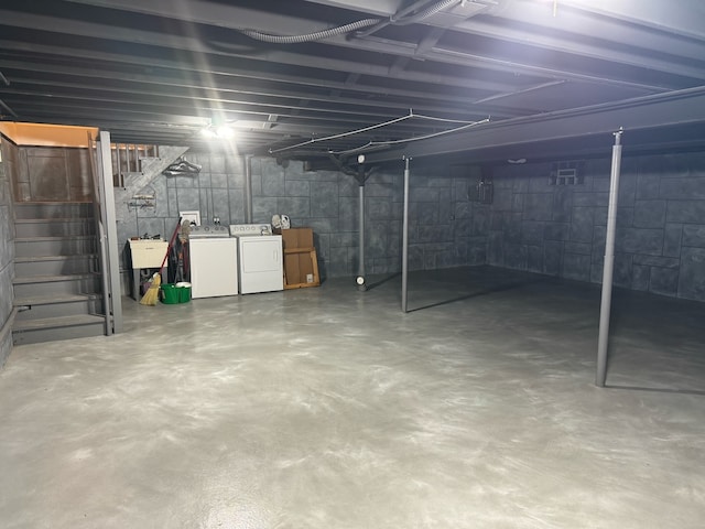 basement with separate washer and dryer