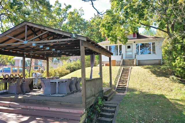 deck featuring a lawn