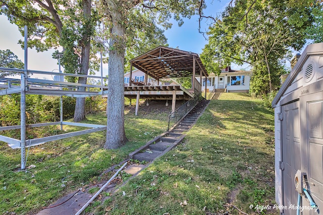 view of yard with a wooden deck