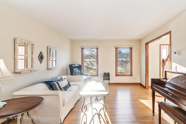 living room with light hardwood / wood-style floors