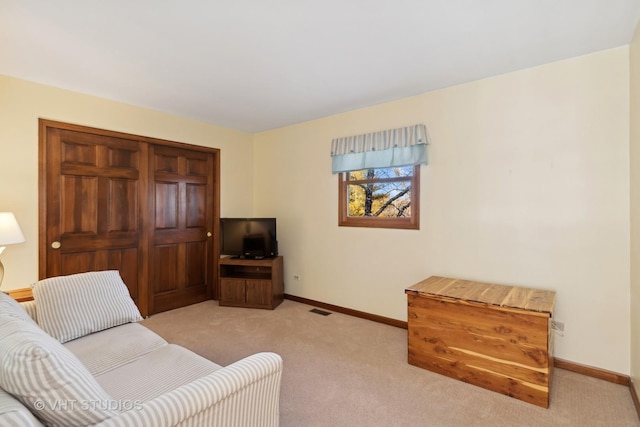 living room featuring light colored carpet