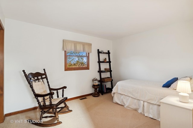 bedroom featuring carpet