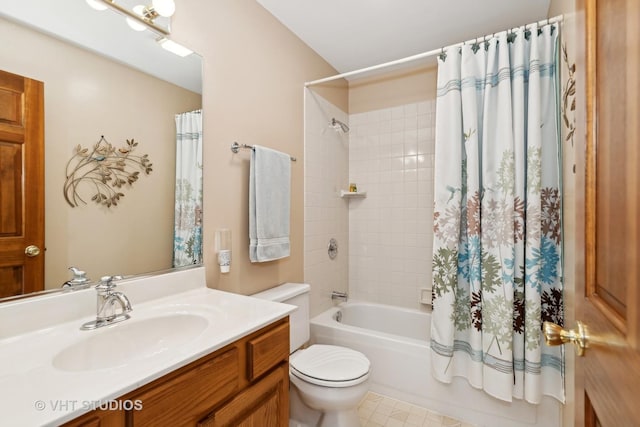 full bathroom with vanity, toilet, and shower / tub combo