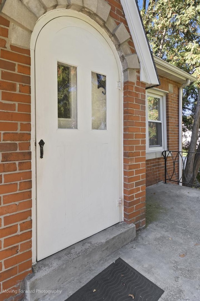 doorway to property featuring a patio