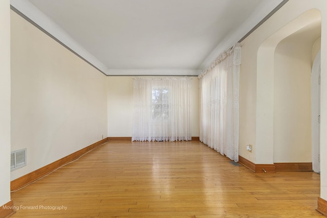 unfurnished room featuring light hardwood / wood-style floors