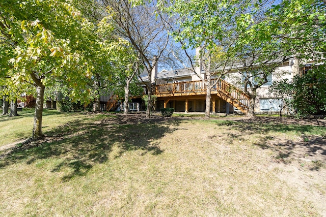 view of yard with a deck