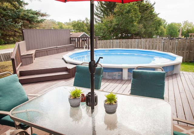 view of pool featuring a deck