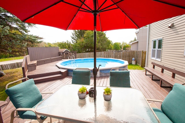 view of pool with a deck