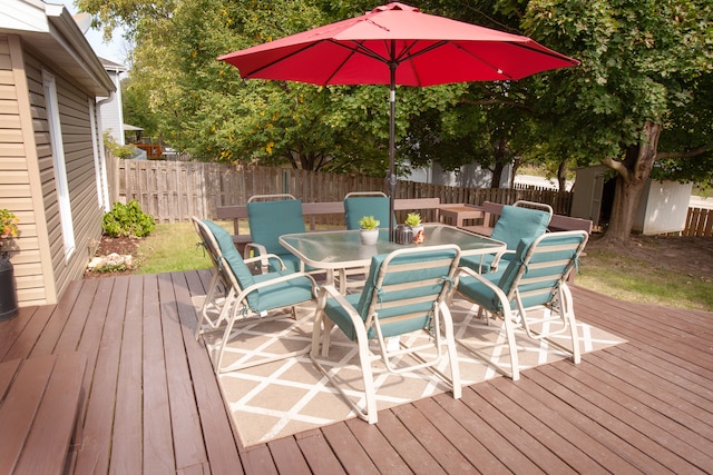 wooden deck with a storage unit