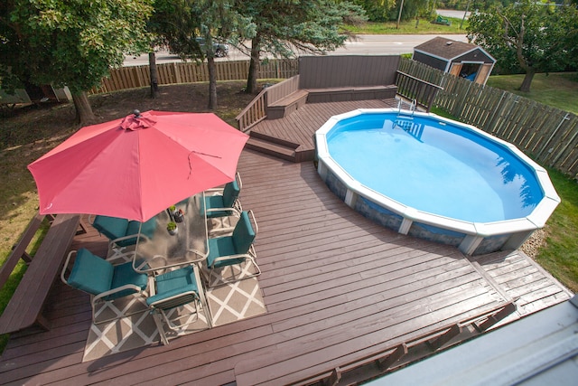 view of pool featuring a deck