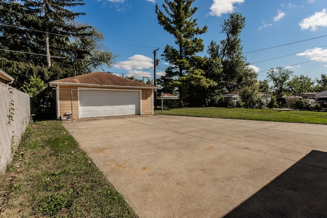 garage featuring a yard