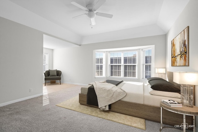 bedroom featuring carpet floors, ceiling fan, and lofted ceiling