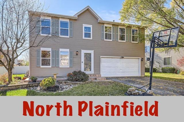 view of front of property with a garage