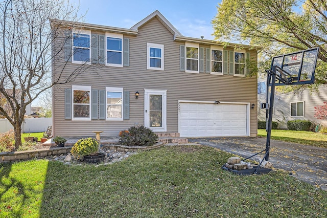 view of front of home featuring a front yard and a garage