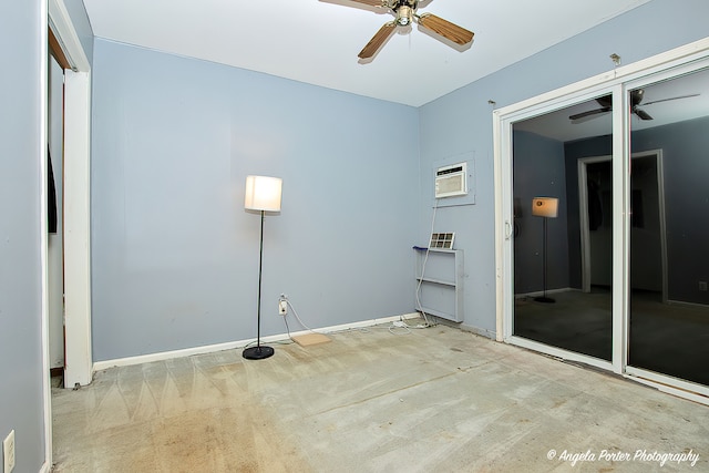 empty room with an AC wall unit and ceiling fan