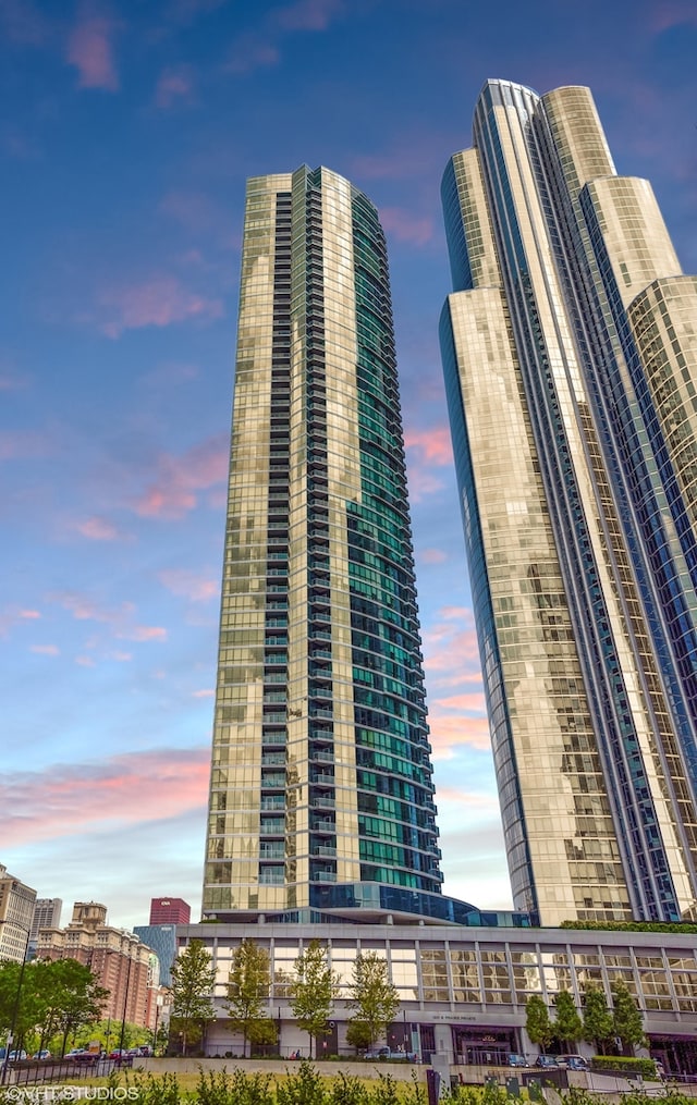 view of outdoor building at dusk