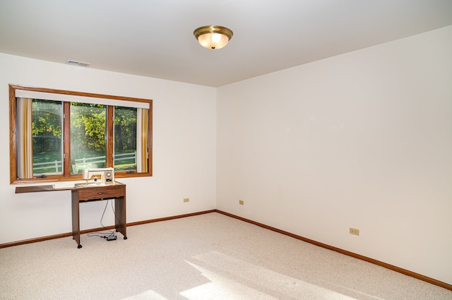 view of carpeted spare room