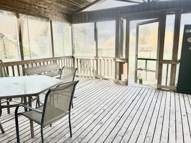 sunroom with vaulted ceiling