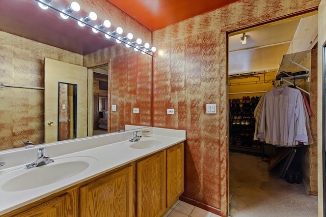 bathroom featuring tile patterned floors and vanity