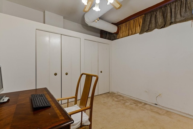 office area featuring ceiling fan and carpet floors