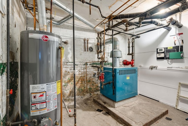 utility room with water heater and a heating unit