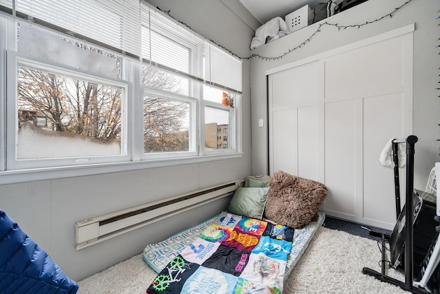 bedroom featuring a baseboard radiator