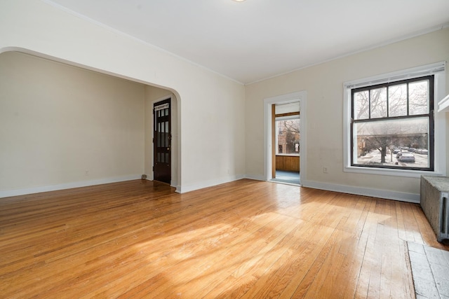 unfurnished room featuring light hardwood / wood-style flooring