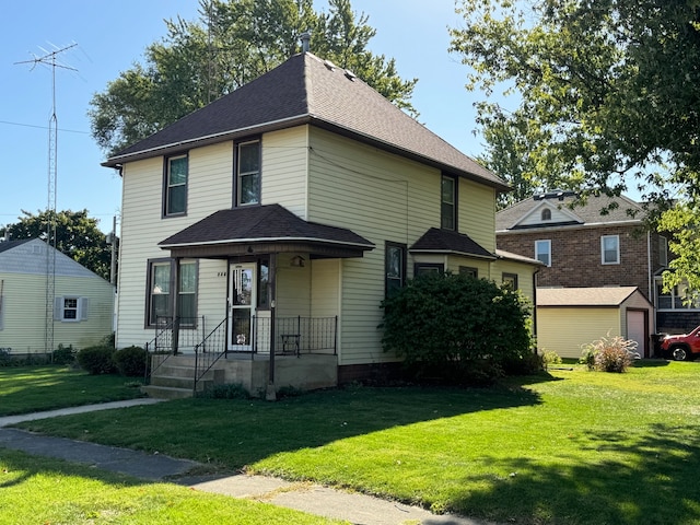 view of front of home featuring a front yard and covered porch