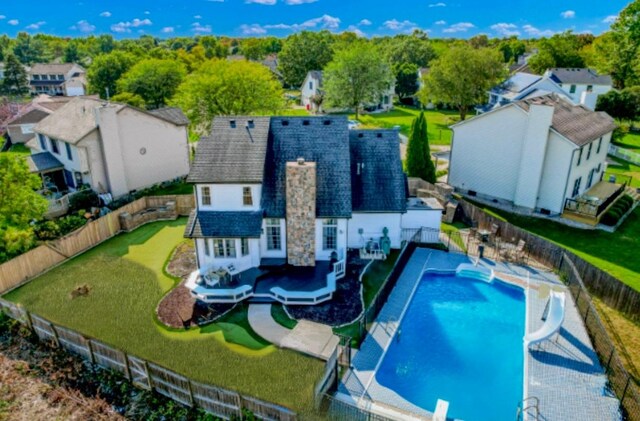 2501 Woodridge Pl, Champaign, IL 61822 - view of swimming pool with a water slide and a residential view