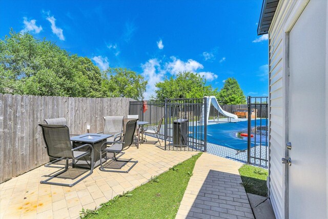 2501 Woodridge Pl, Champaign, IL 61822 - fenced backyard with a patio area